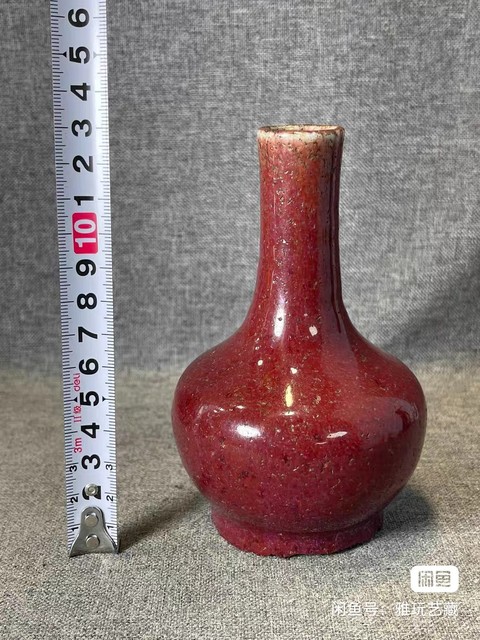 古玩陶瓷窯變紅釉天球瓶真品鑒賞圖