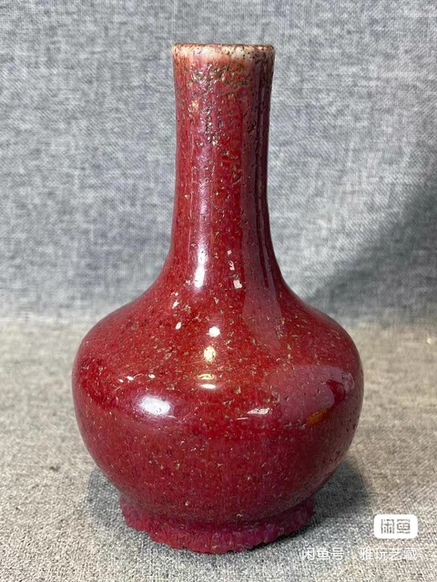 古玩陶瓷窯變紅釉天球瓶真品鑒賞圖