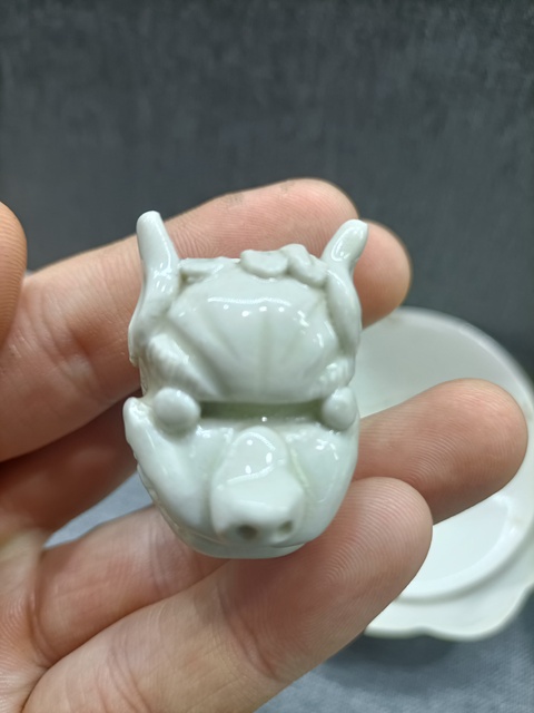 古玩陶瓷宋代定窯白釉獅子標(biāo)本真品鑒賞圖