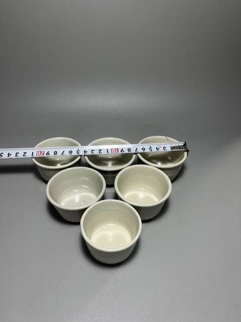 古玩陶瓷明代米黃釉茶杯一套拍賣,當前價格0元
