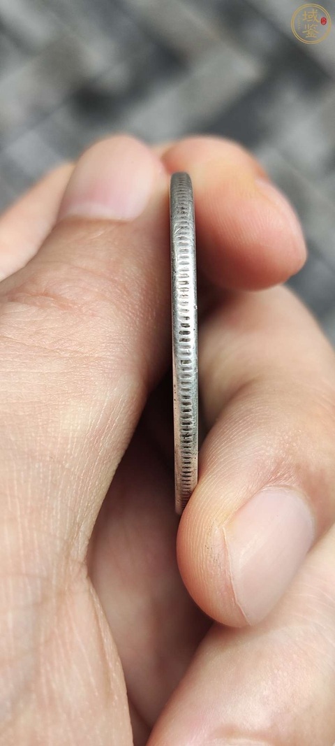 古玩錢幣四川光緒元寶庫平七錢二分銀幣真品鑒賞圖