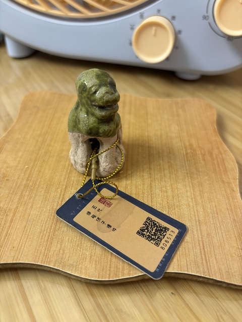 古玩陶瓷綠釉獅子擺件真品鑒賞圖