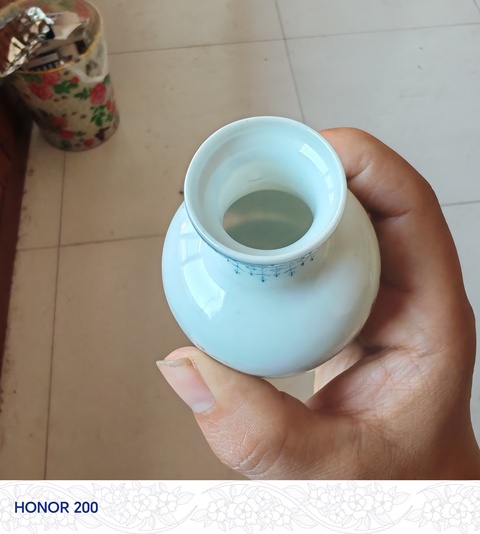 古玩陶瓷嬰戲紋粉彩瓶真品鑒賞圖