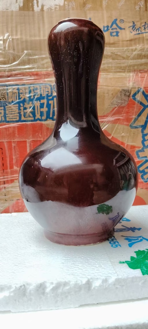 古玩陶瓷紅釉蒜頭瓶拍賣，當前價格9999元