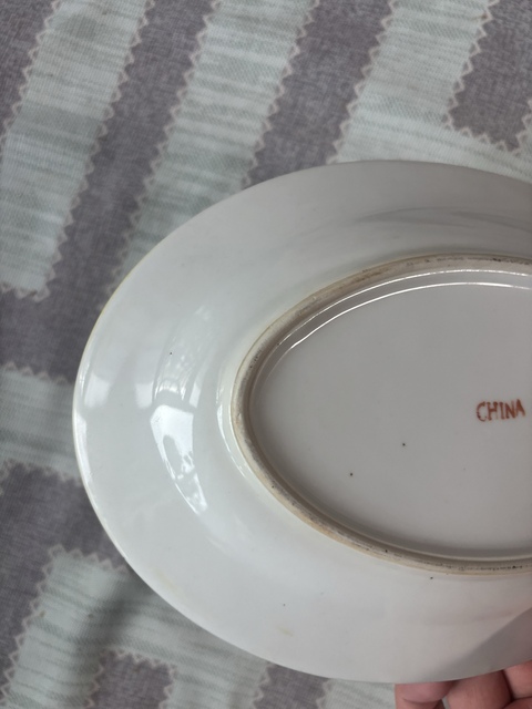 古玩陶瓷黃地粉彩花卉紋盤真品鑒賞圖