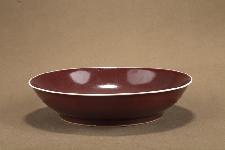 古玩陶瓷清乾隆·霽紅釉七寸盤（官）真品鑒賞圖