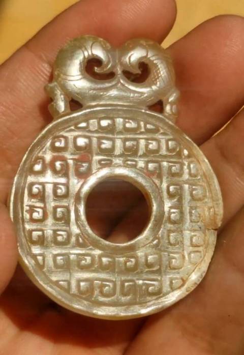 古玩玉器和田玉雕“出廓璧”真品鑒賞圖