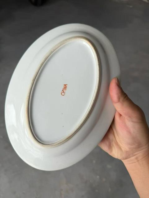 古玩陶瓷黃地粉彩花卉紋盤真品鑒賞圖