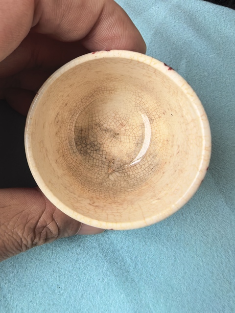 古玩陶瓷吹紅釉臥足杯真品鑒賞圖