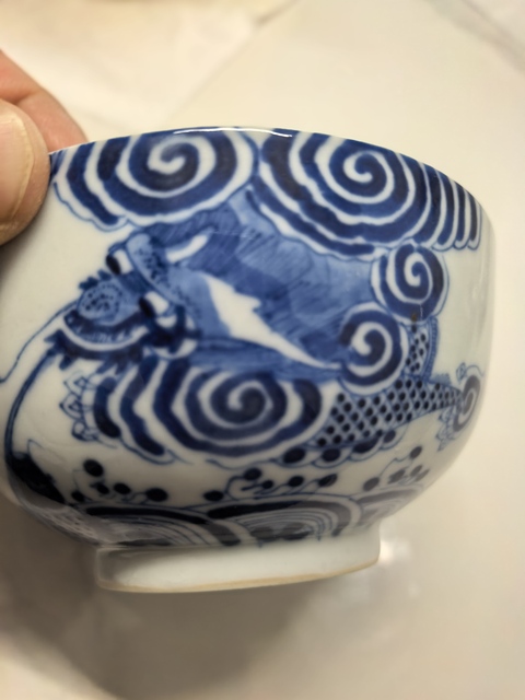 古玩陶瓷青花魚化龍紋茶碗真品鑒賞圖