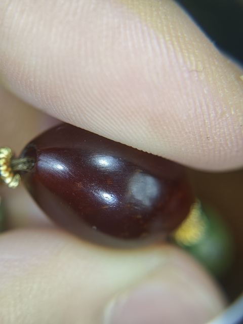 古玩雜項橄欖瑪瑙珠子真品鑒賞圖