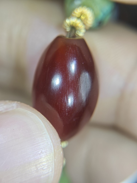 古玩雜項橄欖瑪瑙珠子真品鑒賞圖