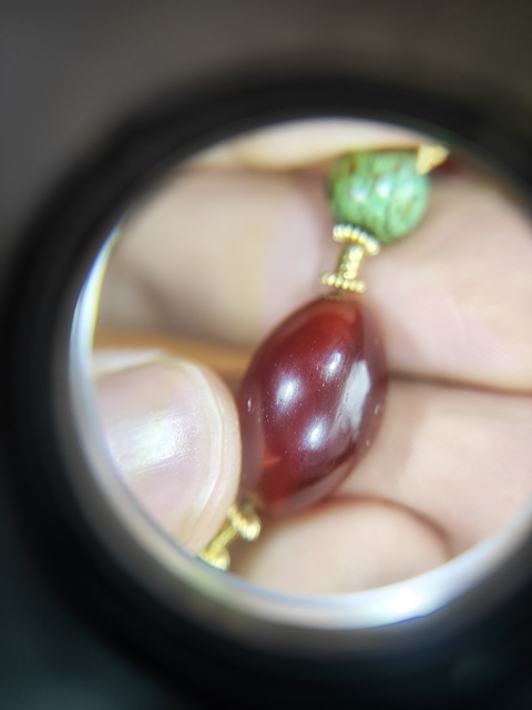 古玩雜項橄欖瑪瑙珠子真品鑒賞圖