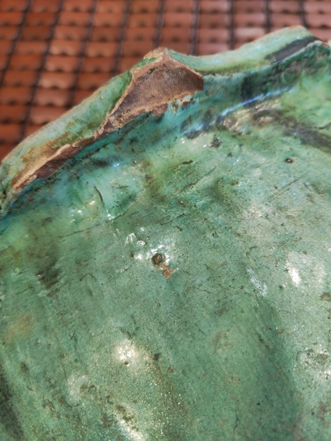 古玩陶瓷綠釉刻花瓷枕真品鑒賞圖