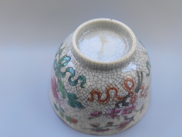 古玩陶瓷煨瓷粉彩花卉紋茶杯真品鑒賞圖