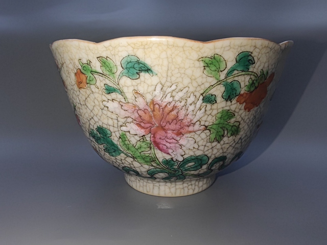 古玩陶瓷煨瓷粉彩花卉紋茶杯真品鑒賞圖