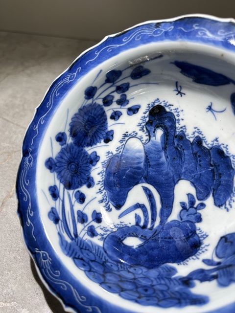 古玩陶瓷(晚清民國)青花洞石花卉紋折沿洗拍賣,當(dāng)前價格0元