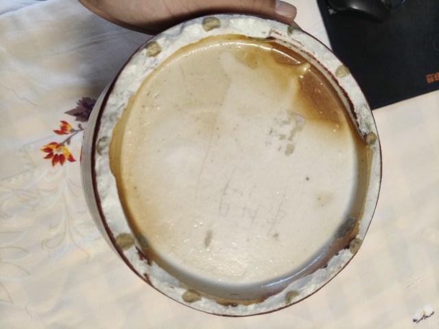 古玩陶瓷窯變紅釉撇口瓶真品鑒賞圖