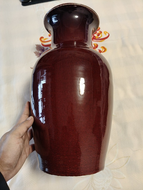 古玩陶瓷窯變紅釉撇口瓶真品鑒賞圖