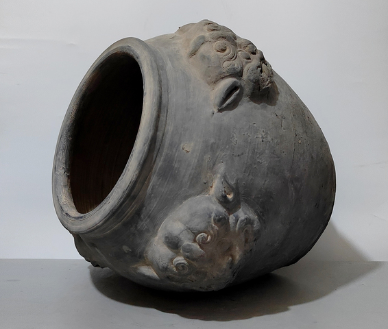 古玩陶瓷黑陶獸頭罐真品鑒賞圖