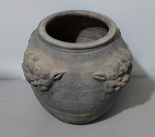 古玩陶瓷黑陶獸頭罐真品鑒賞圖