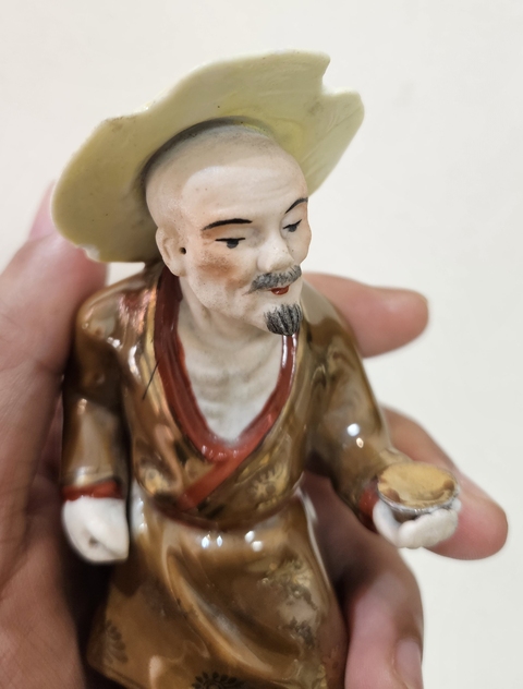 古玩陶瓷紫金釉人物瓷塑真品鑒賞圖