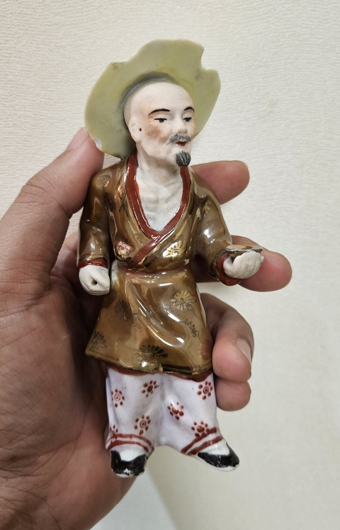 古玩陶瓷紫金釉人物瓷塑真品鑒賞圖