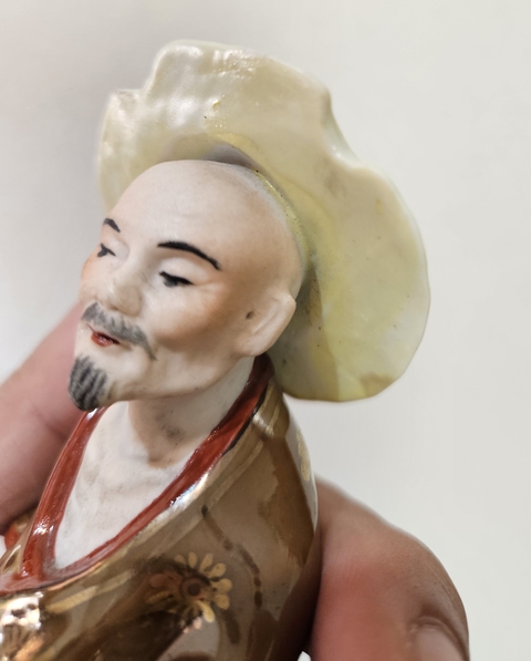 古玩陶瓷紫金釉人物瓷塑真品鑒賞圖