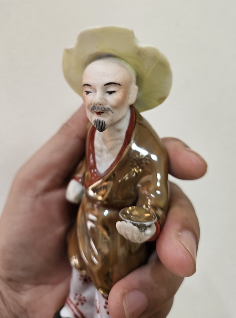 古玩陶瓷紫金釉人物瓷塑真品鑒賞圖