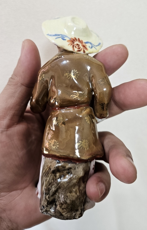 古玩陶瓷紫金釉人物瓷塑真品鑒賞圖