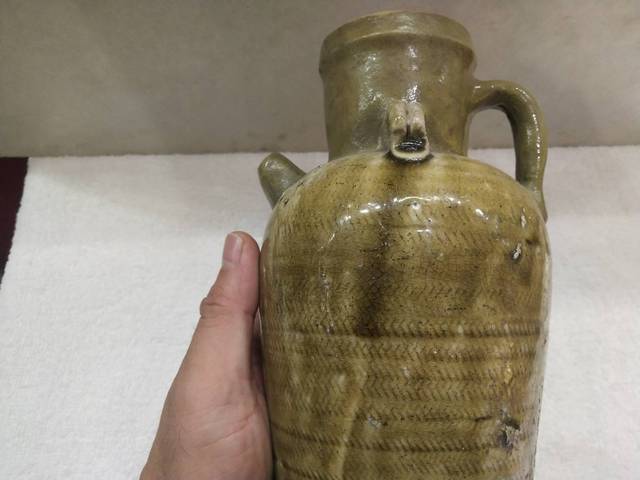 古玩陶瓷唐代邢窯黃釉刻席紋執壺拍賣,當前價格3988元