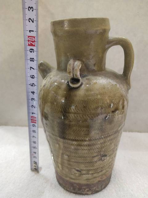 古玩陶瓷唐代邢窯黃釉刻席紋執壺拍賣,當前價格3988元