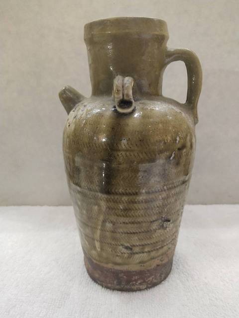 古玩陶瓷唐代邢窯黃釉刻席紋執壺拍賣,當前價格3988元