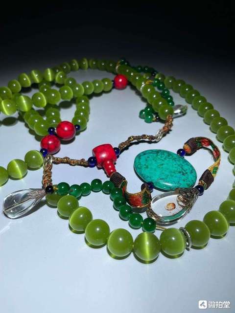 古玩玉器貓眼琉璃珠真品鑒賞圖