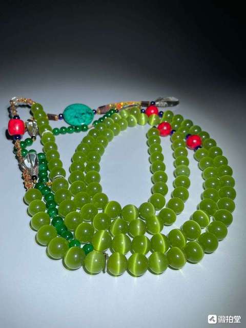 古玩玉器貓眼琉璃珠真品鑒賞圖