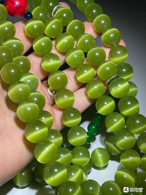 古玩玉器貓眼琉璃珠真品鑒賞圖