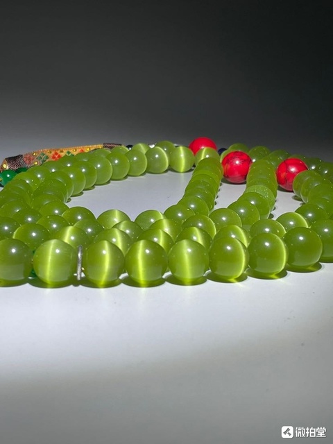 古玩玉器貓眼琉璃珠真品鑒賞圖