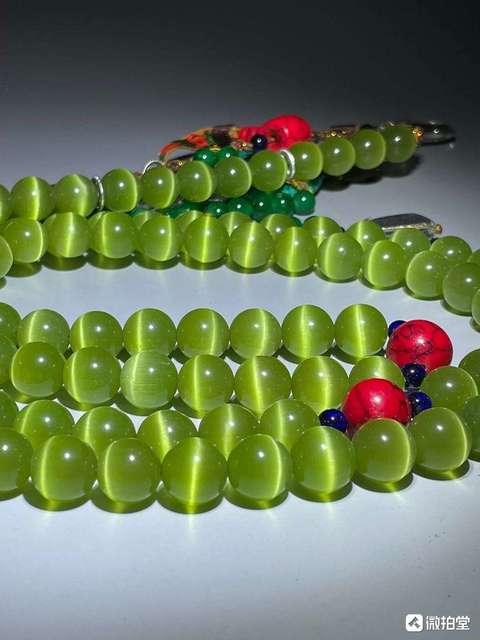 古玩玉器貓眼琉璃珠真品鑒賞圖