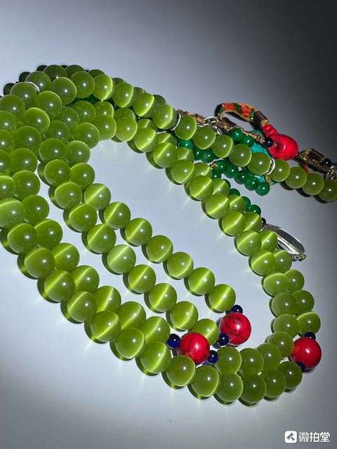 古玩玉器貓眼琉璃珠真品鑒賞圖