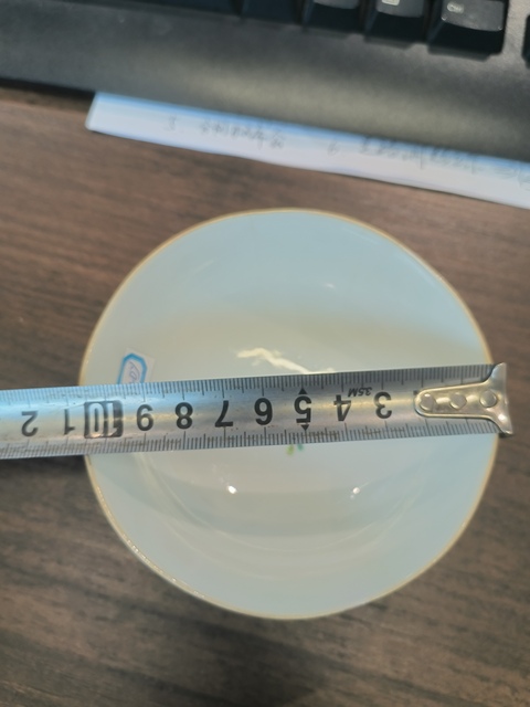 古玩陶瓷粉彩花卉紋茶碗真品鑒賞圖