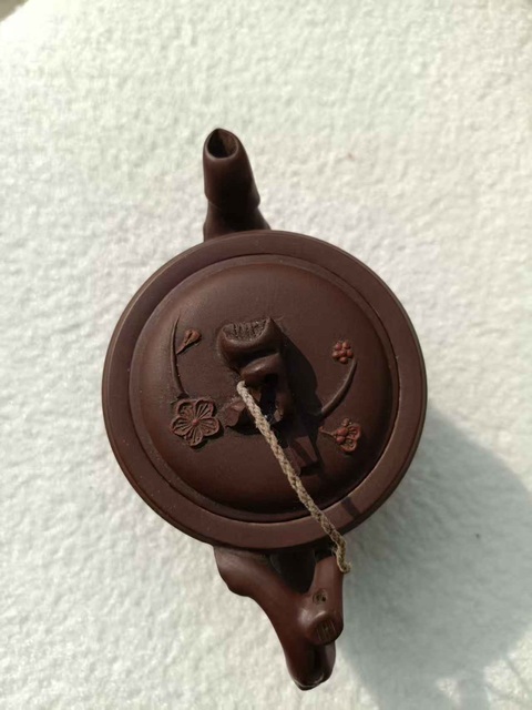 古玩陶瓷堆花卉紋紫砂壺真品鑒賞圖