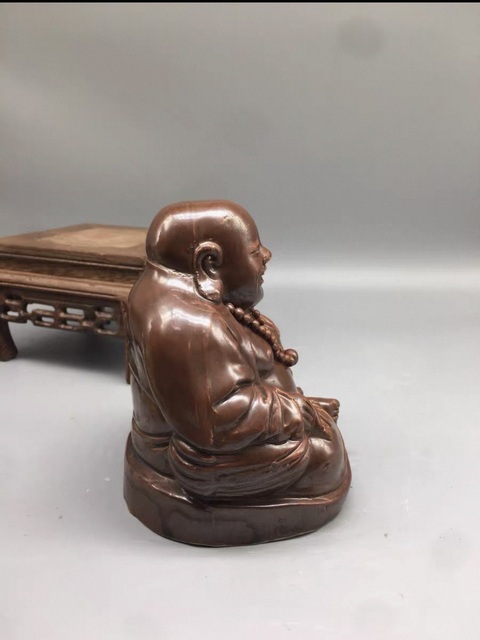 古玩陶瓷德化窯紫金釉造像真品鑒賞圖