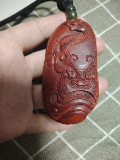 古玩玉器南紅瑪瑙雕“龍紋把件”真品鑒賞圖