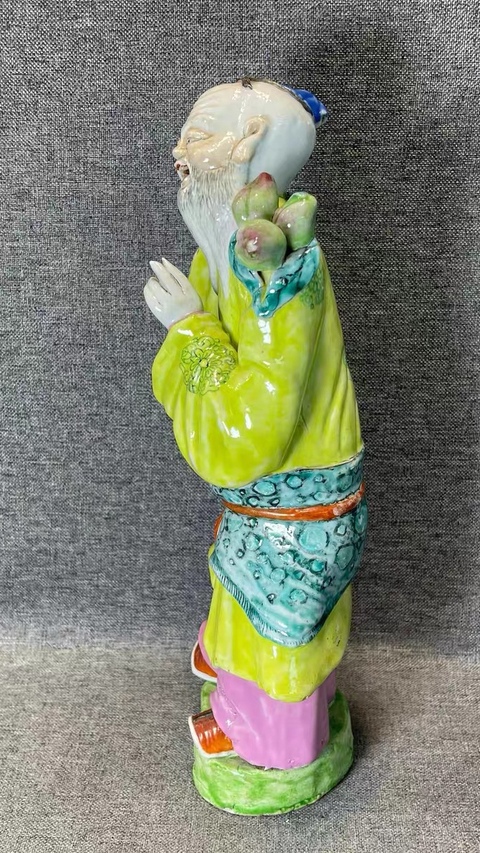 古玩陶瓷東方朔偷桃粉彩塑像真品鑒賞圖