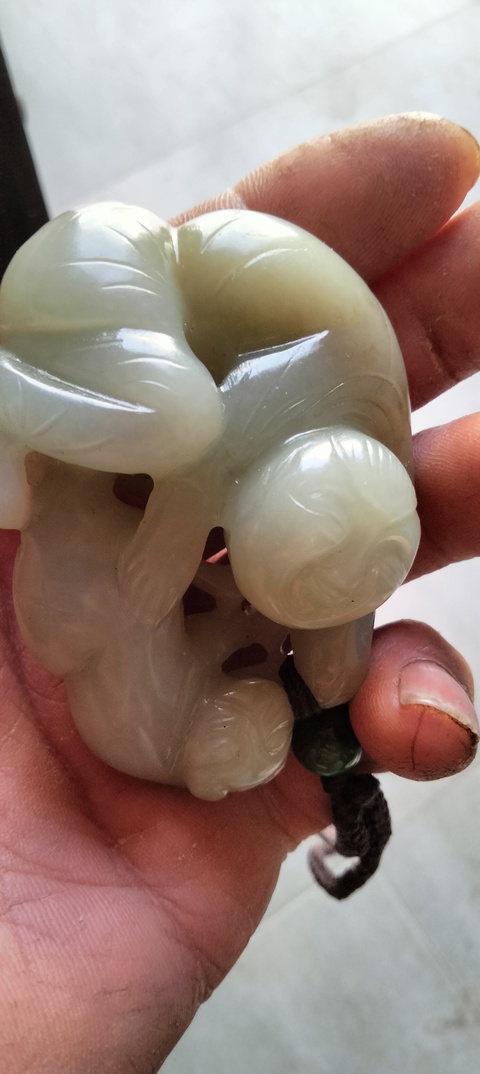 古玩玉器和田玉雕“童子把件”真品鑒賞圖