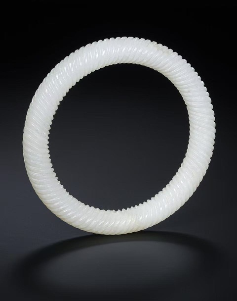 古玩玉器清代和田玉絞絲紋手鐲真品鑒賞圖