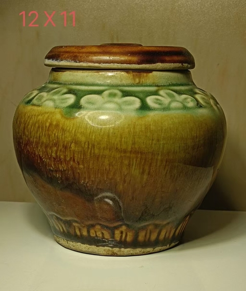 古玩陶瓷褐綠釉印花蓋罐真品鑒賞圖