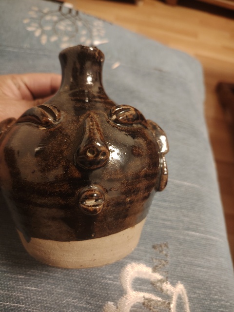 古玩陶瓷褐釉人面壺真品鑒賞圖