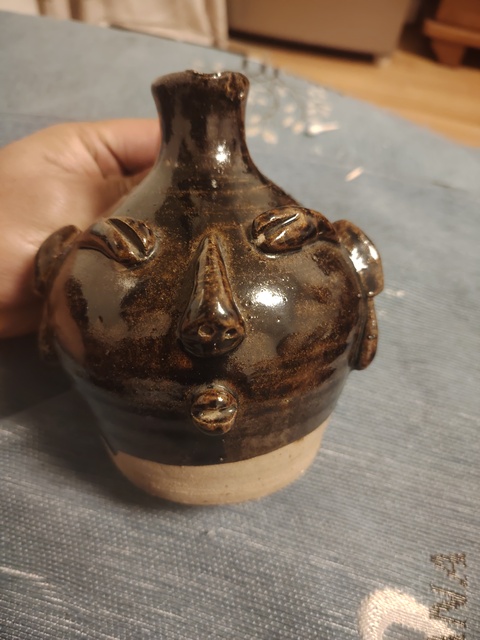 古玩陶瓷褐釉人面壺真品鑒賞圖
