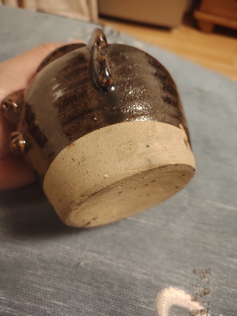 古玩陶瓷褐釉人面壺真品鑒賞圖